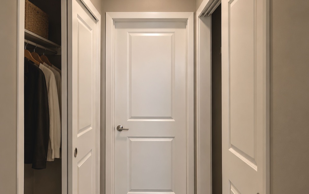 Primary bedroom in the 1B2 apartment at The Swift at Petworth featuring abundant natural light and generous closet space