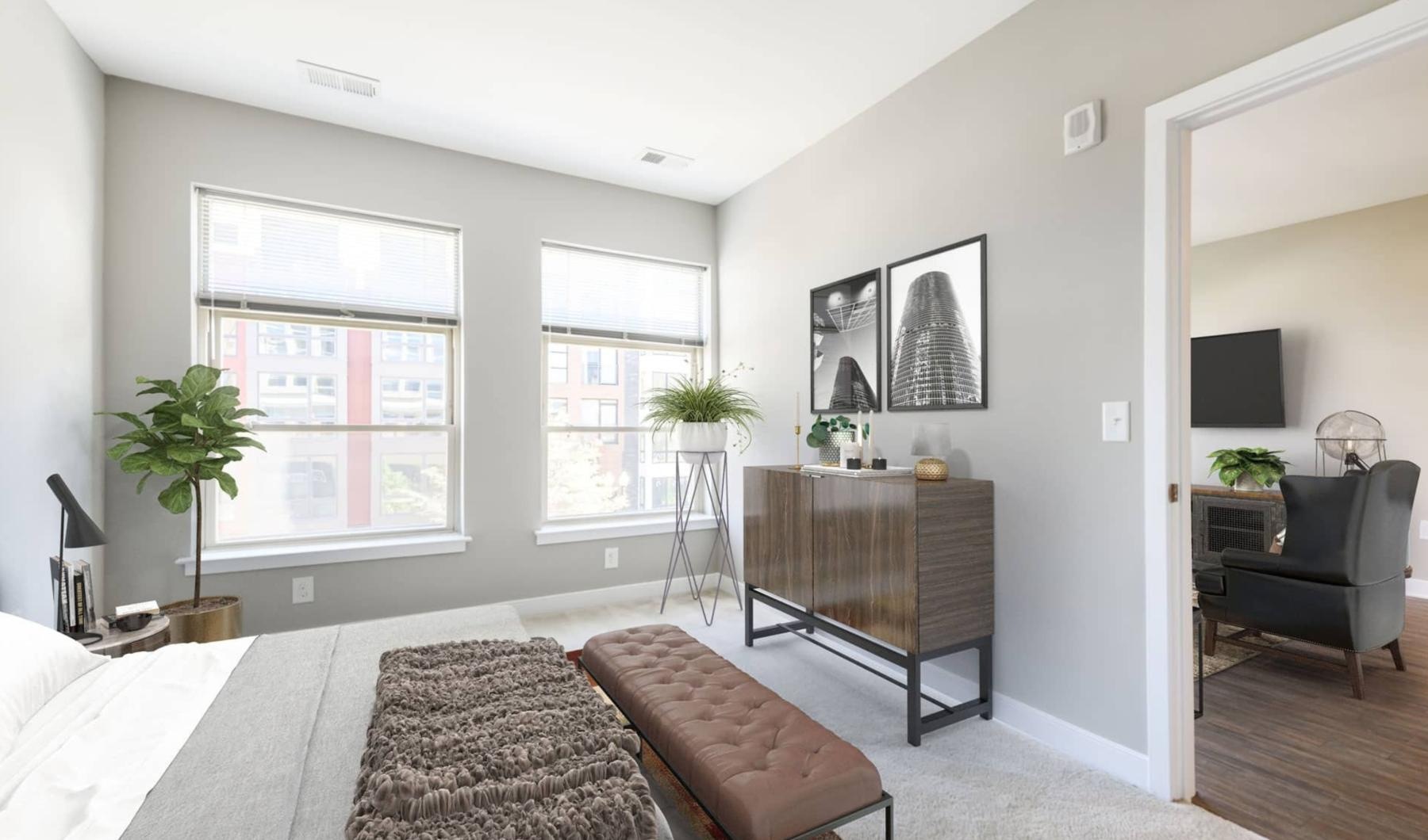 a bedroom with a bed and a dresser
