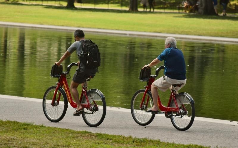 two people riding bikes