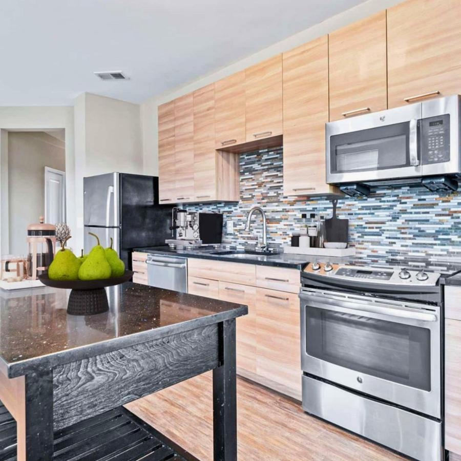 a kitchen with a table and chairs