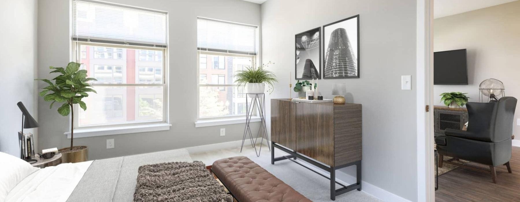 a bedroom with a a bed and a dresser