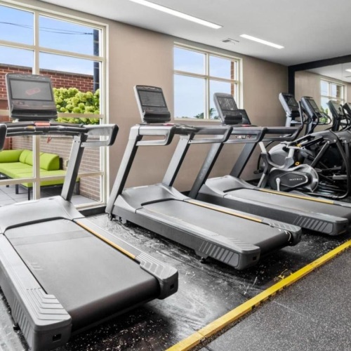 a gym with treadmills
