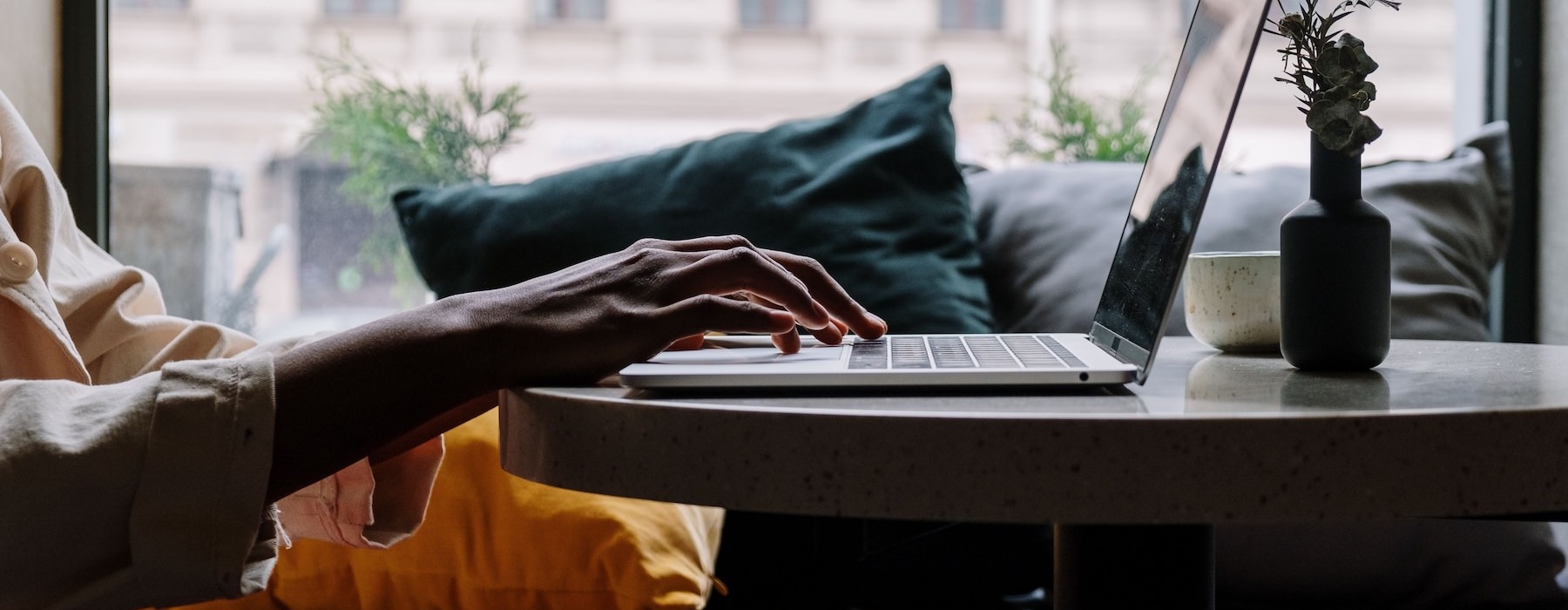a person typing on a computer